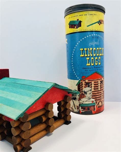 A Tin Can And Some Logs On A Table