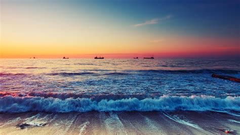 Download 1920x1080 Ocean Beach Sunset Horizon Scenic