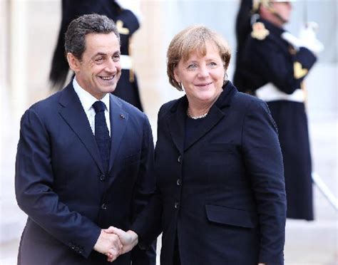 Sarkozy Merkel Agree On New Eu Treaty Cn