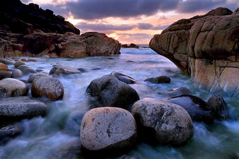 Time Lapse Photography Of Body Of Water With Rocks During Daytime Hd Wallpaper Wallpaper Flare