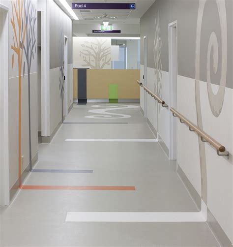 Stripe On Floor Up To Graphic On Wall For Wayfinding Sunshine