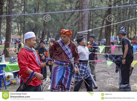 Wau game is one of the traditional games of the malays since hundreds of years ago. Outdoor Traditional Games editorial photo. Image of hunter ...