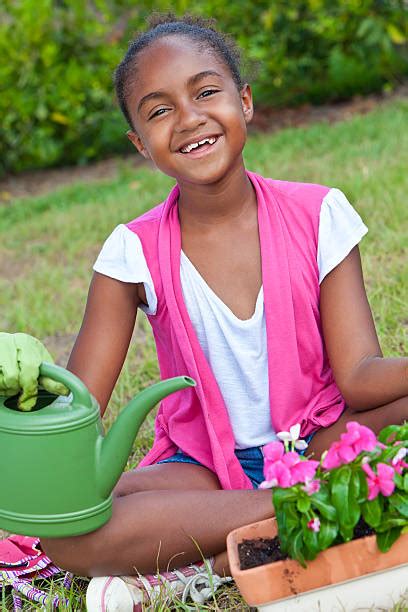 110 African American Girl Watering Can Stock Photos Pictures