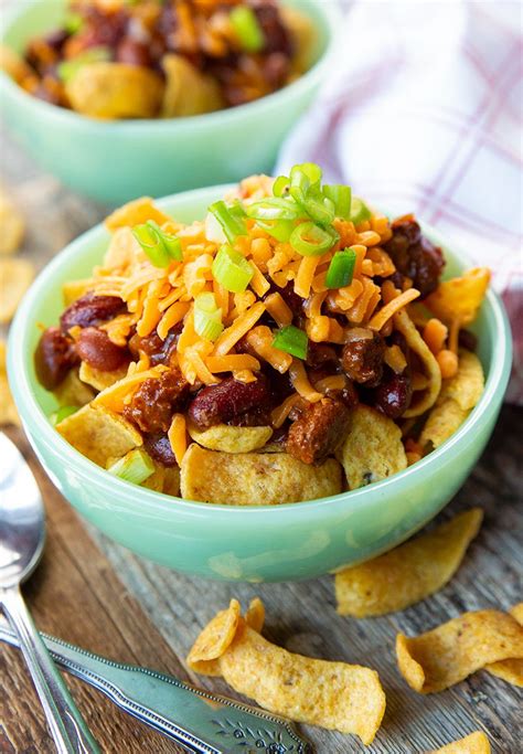 The Classic Texas Style Frito Pie Chili Fritos Shredded Cheddar And