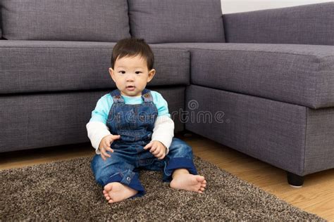 Little Boy Sitting On Carpet Stock Photo Image Of Isolated