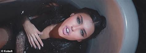I hope you like it. Madison Beer lays nude in a bathtub during music video for ...