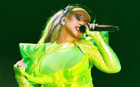 Christina Aguilera Pops In Neon Green Costume At Brighton Pride