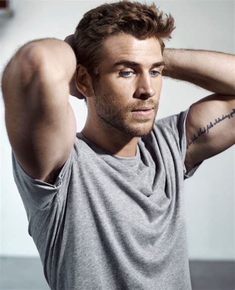But it looks like chris hemsworth, 34, may not have the same threshold for pain as his almighty the aussie actor grimaced in pain while enduring a small commemorative avengers tattoo on his right rib. my new plaid pants: Liam Hemsworth Eight Times