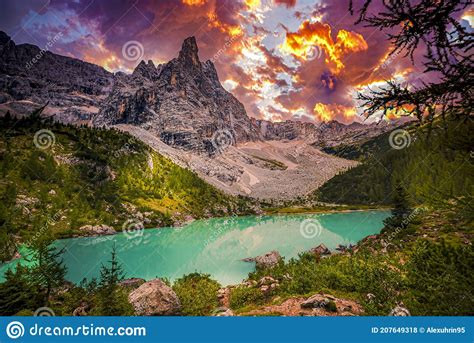 Famous Turquoise Lake Sorapis With High Mountains At Sunset Dolomites
