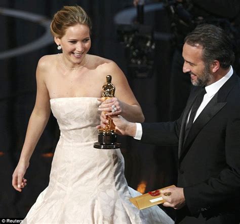 Jennifer Lawrence Falls On The Stairs As She Goes To Accept Her Best
