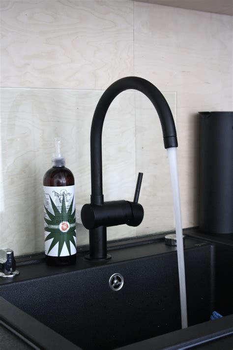 Black Tap And Sink But Dont Like The Silver Detailling Black Granite