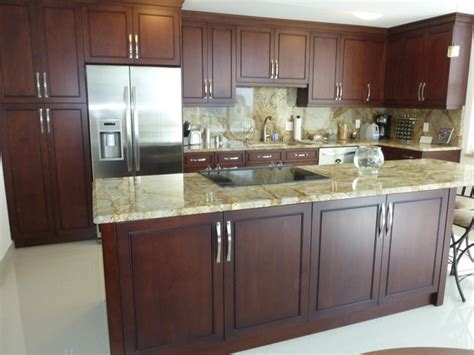 Dark cabinet finishes continue to see a trending uptick. Contemporary Kitchen Cabinetry Cherry Brown Stain Finish ...