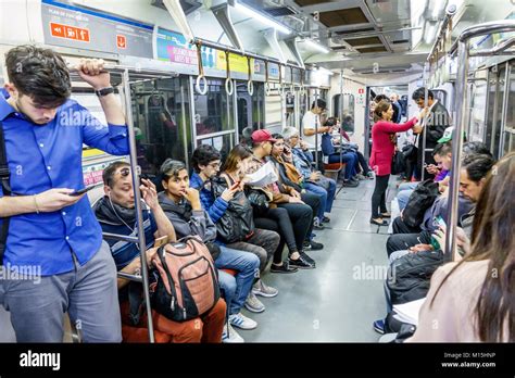 buenos aires argentina subte subway public transportation train inside passenger passengers