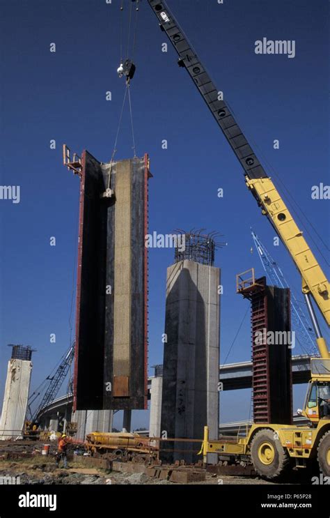 Using Crane To Move Bridge Column Concrete Forms From Completed Column