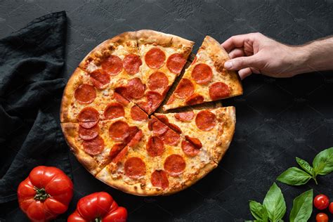 Hand Picking Slice Pepperoni Pizza Stock Photo Containing Pizza And