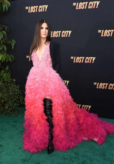 Sandra Bullock Wore Thigh High Leather Boots With Her Plunging Pink