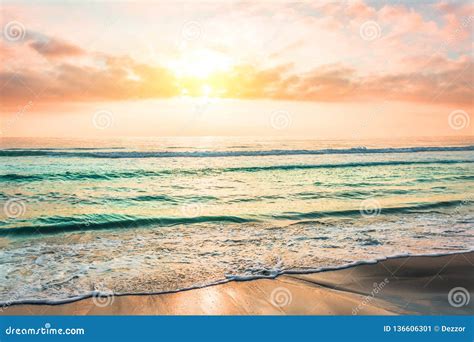 Amazing Sunset On A Sandy Beach Of An Island In The Ocean Stock Image