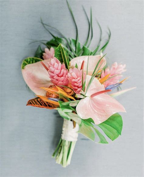 Tropical Bridal Bouquet Tied And Accented With Monstera Palm Leaves