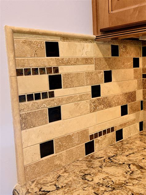 Squeeze the handles until the nippers cut through the tile and break the glass, keeping the nippers aligned with the marks you've drawn. Brown Glass Travertine Mix Backsplash Tile for Traditional ...