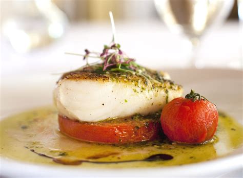 Chilean Sea Bass On Roasted Tomato With Basil Pesto And Balsamic Reduction Cooking Recipes