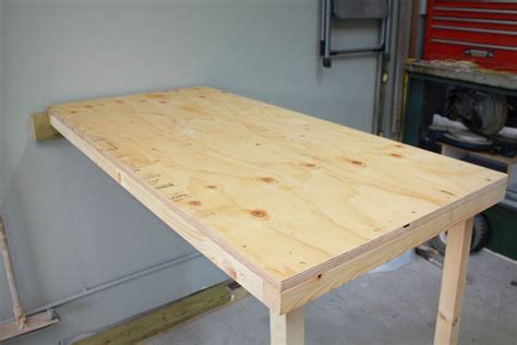 What are some popular features for folding tables? Turtles and Tails: Fold-up Garage Worktable | Woodworking ...