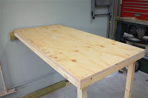 Built from pine 2x4, 4x4 and 3/4, 1/2 mdf plywood. Turtles and Tails: Fold-up Garage Worktable | Woodworking ...