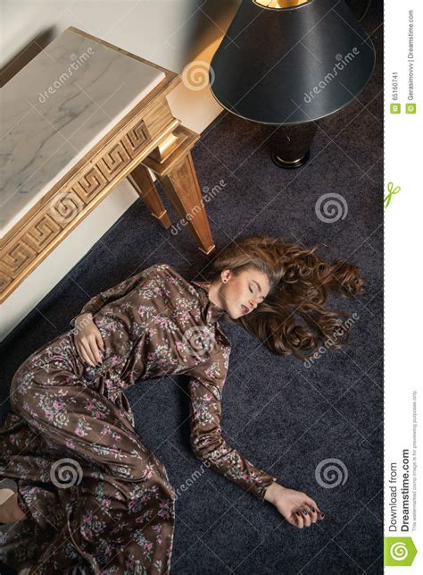 Unconscious Woman Lying In Cartons Royalty Free Stock
