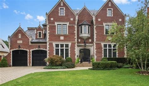 Amazing gallery of interior design and decorating ideas of limestone house in living rooms, home exteriors, pools, bathrooms, laundry/mudrooms, kitchens by elite interior designers. $2.9 Million Brick & Limestone Home In Kenilworth, IL ...