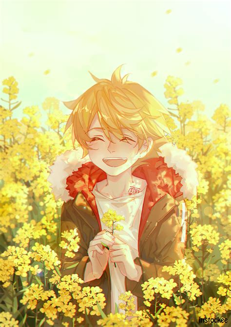 A Person Standing In A Field Of Yellow Flowers With Their Hands