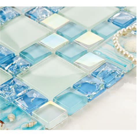 cracked blue glass mosaic mediterranean style resin with conch shell beach inspired backsplash