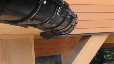 Installation of Lindab Rainline Gutters in the Round - YouTube