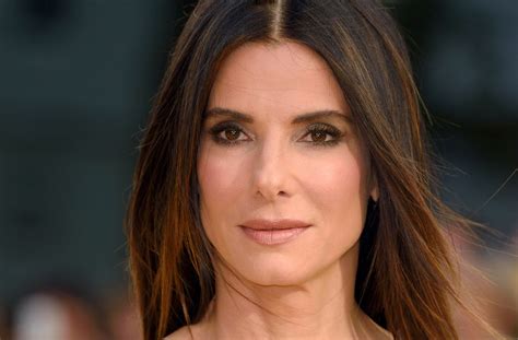 sandra bullock shows off ageless skin at the minions premiere glamour