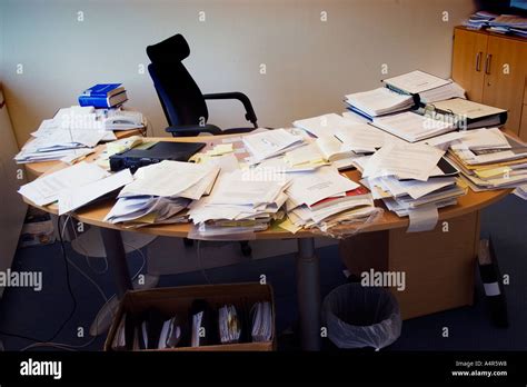 Messy Desk At Office Stock Photo Alamy