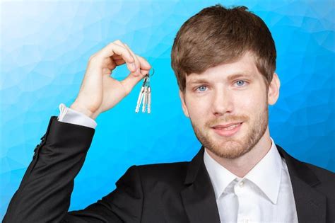 Premium Photo Real Estate Agent Showing New House Key