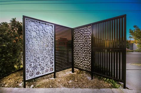 Outdoor laser cut screens can be installed outdoors as part of a pergola, canopy, brise soleil, decorative wall, metal gate, or series of divider screens. Landscape & Privacy Screens - Iron Bark Metal Design
