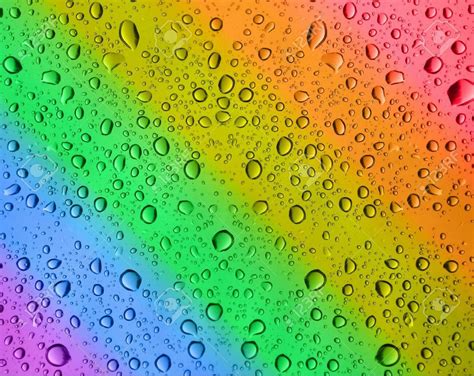 Close Up Of Rainbow Water Drops Stock Photo Picture And Royalty