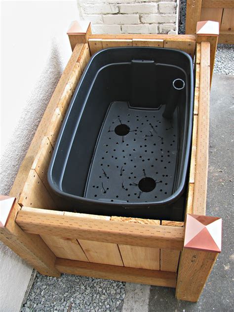 It is not that much of an investment, really. Self Watering Planter Box | Finally finished my planter ...