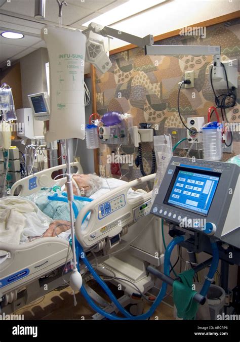 An Intensive Care Unit Icu With An Elderly Female Patient On A