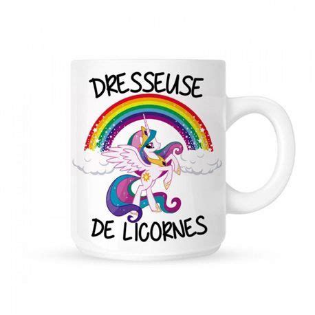 A White Coffee Mug With The Words Dessues De Loress On It