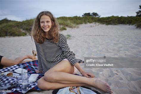 Portrait Of Cute Teen Girl Hanging Out At Beach High Res Stock Photo