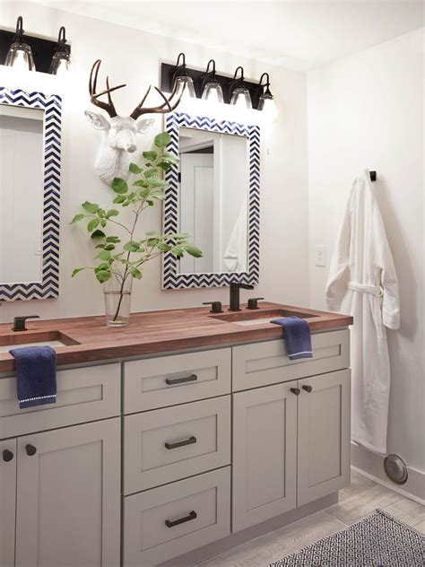 A black and white theme works well for formal bathrooms, while pastels and neutrals are perfect for casual interiors. HGTV Dream Home 2018: Shared Downstairs Bathroom Pictures ...