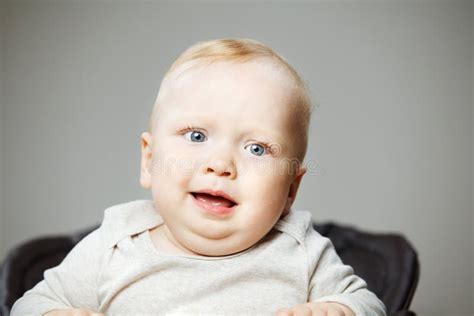 Baby Boy With Confused Face Expression Portrait Photo Stock Photo