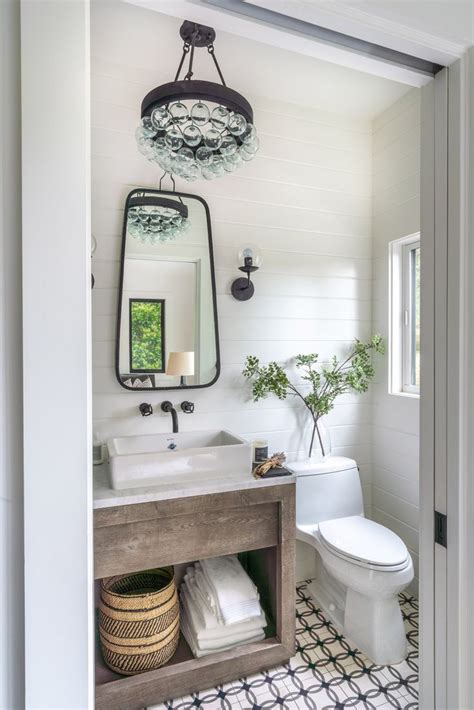 My mom gave me this antique window, and it's been displayed in every room in our house, until finding it's permanent place in the powder room. modern farmhouse bathroom neutral bathroom, neutral powder ...