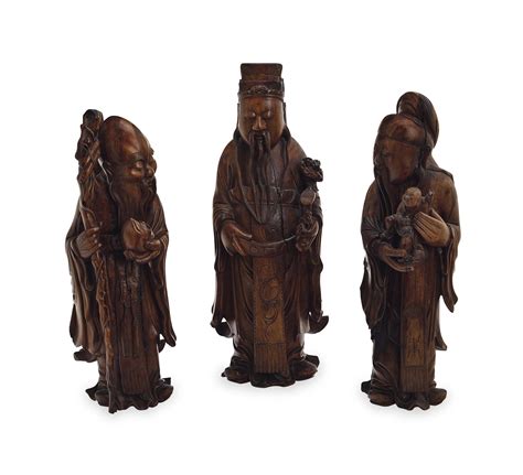 Three Chinese Carved Wood Figures Of Immortals