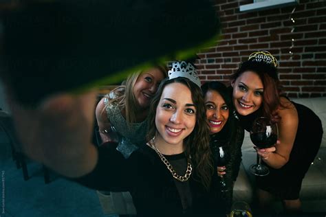 Nye Friends Pose For Selfie At Holiday Party By Stocksy Contributor Sean Locke Stocksy
