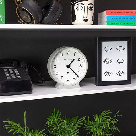 Newgate M Mantel Echo Clock In A Grey Silicone Finish On A Shelf