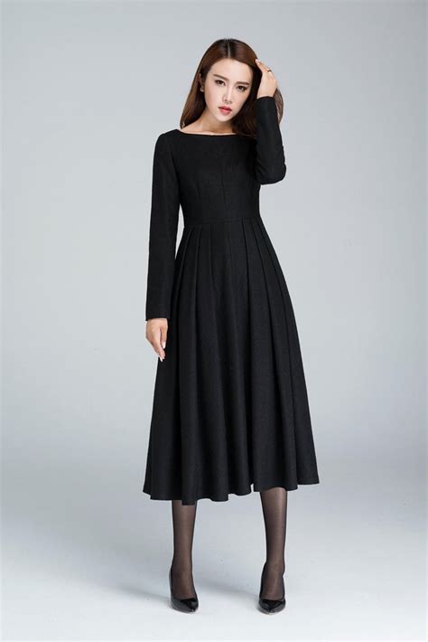Black Winter Midi Wool Dress Boat Neck Pleated Dress Long Sleeve Dress With Pockets Fitted