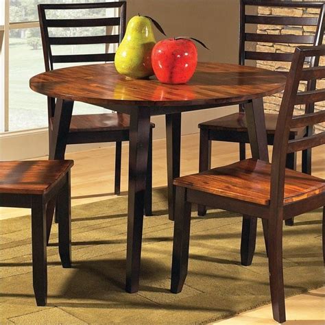 Would you like a beautifully designed dinette set that has a fabulous would you like large comfortable chairs with padded backs for seating comfort and a matching bench to use for even more room? Steve Silver Company Abaco Double Drop Leaf Round Casual ...