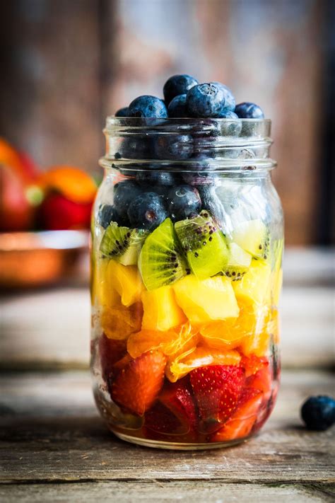 Here are some ideas to help you. Colourful fruit salad on a jar with strawberry, orange ...