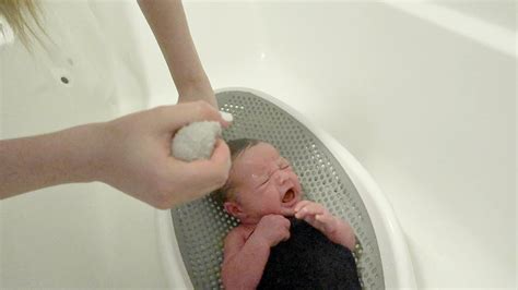 Our Newborn Babys First Bath Youtube